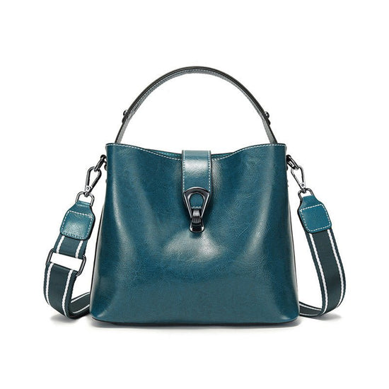 Women's Autumn And Winter Bucket Bag Shoulder Messenger Bag $48.99 Dana Fashion Color: Peacock Blue Women's Bags Product information: Lining texture: polyester cotton Applicable scenarios: Daily matching Color: milky white, peacock blue, coffee, caramel,