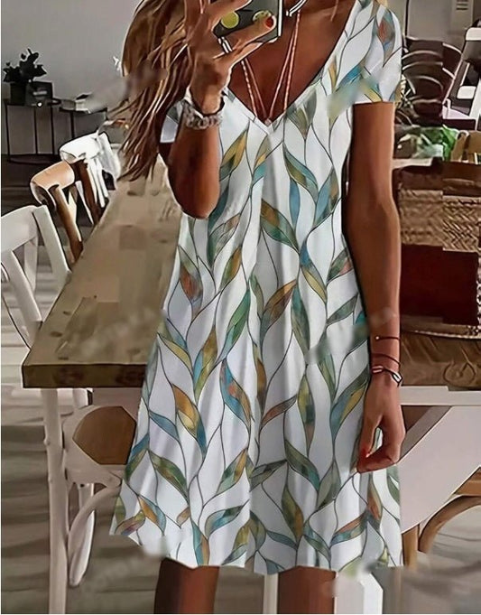 Women'S Casual Resort V-Neck Leaf Print Short-Sleeved Dress $22.45 Dana Fashion Color: Multicolor Size: 2XL Women's clothing خط العنق: رقبة على شكل حرف V نوع الأكمام: كم عادي النمط: كاجوال النوع:خط A خط الخصر: طبيعي شكل الحاشية: متسع اللون:متعدد الألوان ن