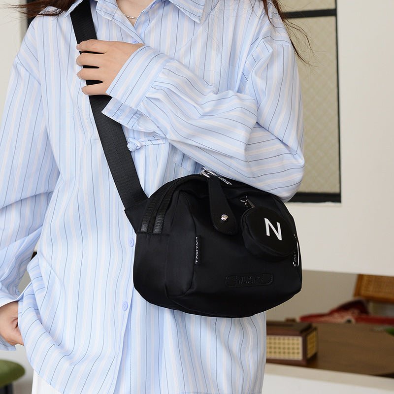 Women's Crossbody Canvas Shell Shoulder Bag $29.23 Dana Fashion Color: Beige Women's Bags Product information: Lining texture: Oxford cloth Color: Mother Shell [beige], mother shell [Orange White], mother shell [black]] Hardness: medium Material: Oxford c
