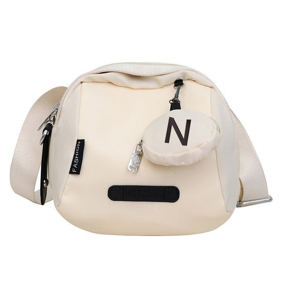 Women's Crossbody Canvas Shell Shoulder Bag $29.23 Dana Fashion Color: Beige Women's Bags Product information: Lining texture: Oxford cloth Color: Mother Shell [beige], mother shell [Orange White], mother shell [black]] Hardness: medium Material: Oxford c