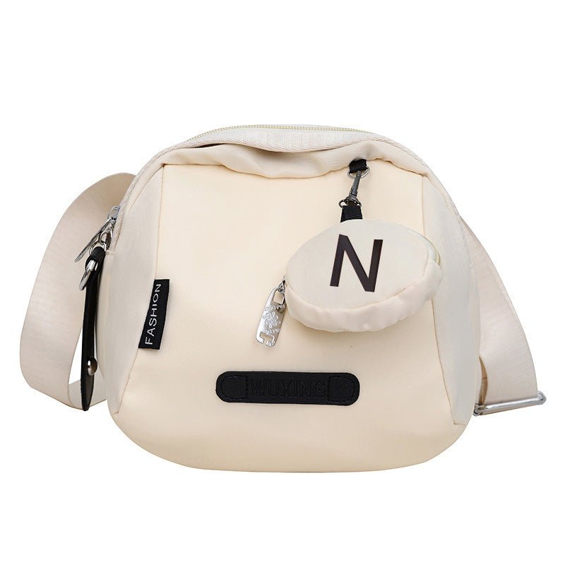 Women's Crossbody Canvas Shell Shoulder Bag $29.23 Dana Fashion Color: Beige Women's Bags Product information: Lining texture: Oxford cloth Color: Mother Shell [beige], mother shell [Orange White], mother shell [black]] Hardness: medium Material: Oxford c