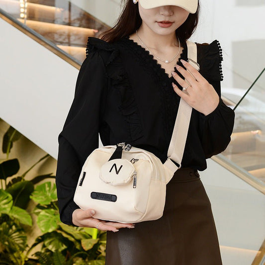 Women's Crossbody Canvas Shell Shoulder Bag $29.23 Dana Fashion Color: Beige Women's Bags Product information: Lining texture: Oxford cloth Color: Mother Shell [beige], mother shell [Orange White], mother shell [black]] Hardness: medium Material: Oxford c