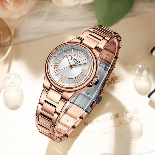 Women's Fashion Clock Steel Belt Watch $40.00 Dana Fashion Color: Gold Shell White Women's Accessories Product information: Color: white shell White, white shell pink, rose shell white, gold shell white, rose shell blue Thickness: 9mm Applicable people: F