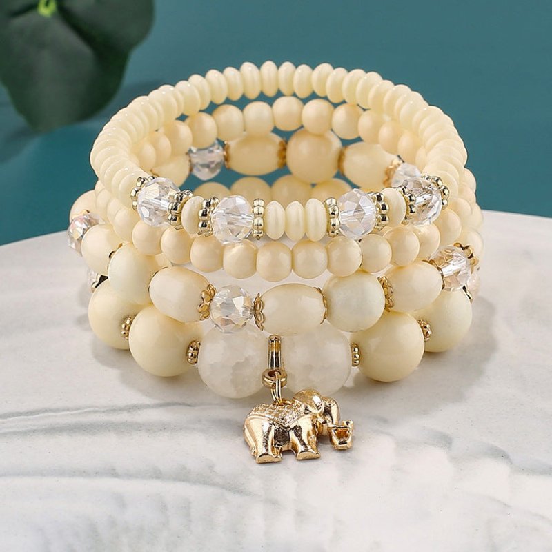 Women's Fashion Elephant Pendant Crystal Bracelet $17.00 Dana Fashion Color: B0253 Beige Women's Accessories Product information: Treatment Process: Electroplating Color: B0253-beige,B0253-dark mixed, B0253-coffee,B0253-yellow,B0253-Blue Black, B0253-new