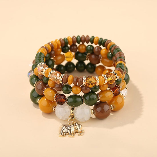 Women's Fashion Elephant Pendant Crystal Bracelet $17.00 Dana Fashion Color: B0253 New Mixed Color Women's Accessories Product information: Treatment Process: Electroplating Color: B0253-beige,B0253-dark mixed, B0253-coffee,B0253-yellow,B0253-Blue Black,