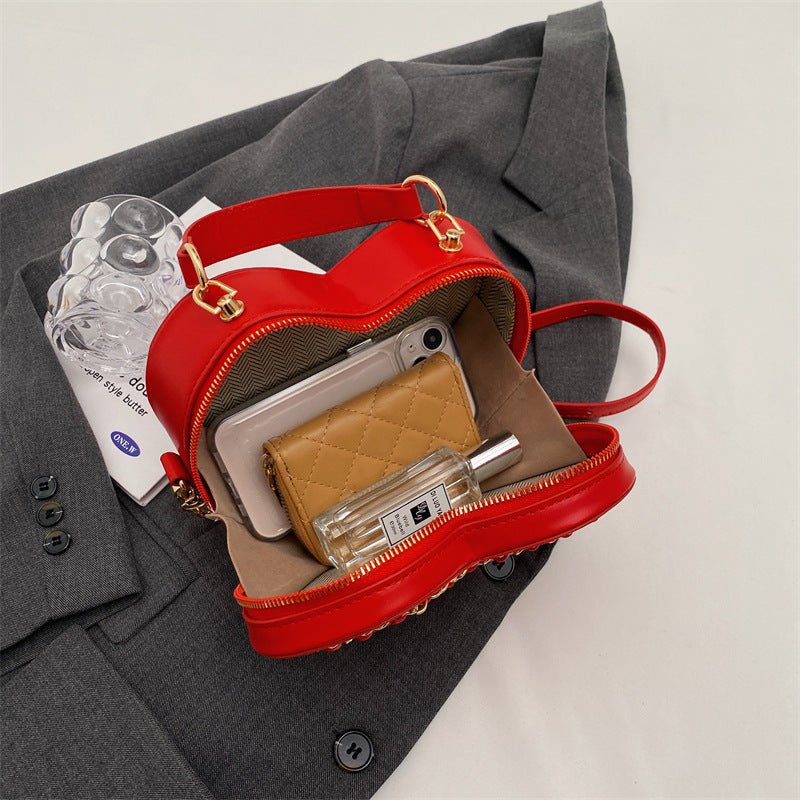 Women's Fashion Large Capacity Chain Shoulder Messenger Bag $47.34 Dana Fashion Color: Beige Women's Bags Product information: Lining texture: Polyester Color: black, beige, pink, red Material: PU Bag internal structure: mobile phone bag, file bag Style: