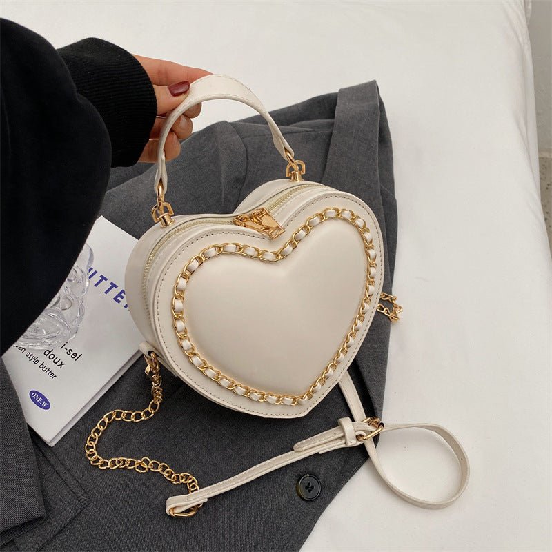 Women's Fashion Large Capacity Chain Shoulder Messenger Bag $47.34 Dana Fashion Color: Beige Women's Bags Product information: Lining texture: Polyester Color: black, beige, pink, red Material: PU Bag internal structure: mobile phone bag, file bag Style: