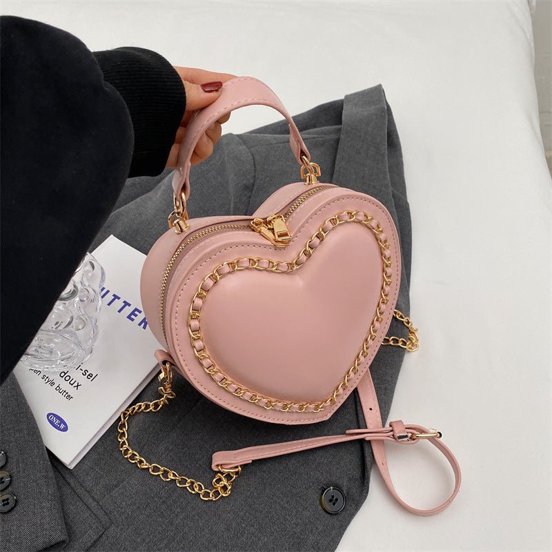 Women's Fashion Large Capacity Chain Shoulder Messenger Bag $47.34 Dana Fashion Color: Pink Women's Bags Product information: Lining texture: Polyester Color: black, beige, pink, red Material: PU Bag internal structure: mobile phone bag, file bag Style: s