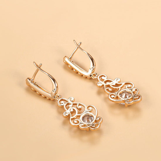 Women's Fashion Long Pattern Zircon Earrings $13.90 Dana Fashion Color: H0222 Rose Gold Women's Accessories Product information: Color: H0222 rose gold Style: Women's Material: Copper Shape: U-shaped Popular elements: Flowers Packing list: Earrings *1 pai