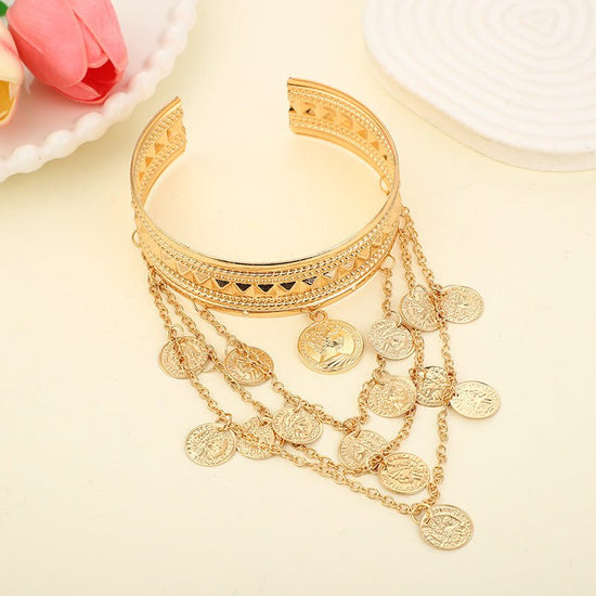 Women's Fashion Metal Coin Tassel Arm Chain $11.55 Dana Fashion Color: Gold Women's Accessories Product information: Color: white, gold Style: Women's Function: Decoration Material: Metal Shape: Wave Packing list: Arm bracelet *1 Product Image: