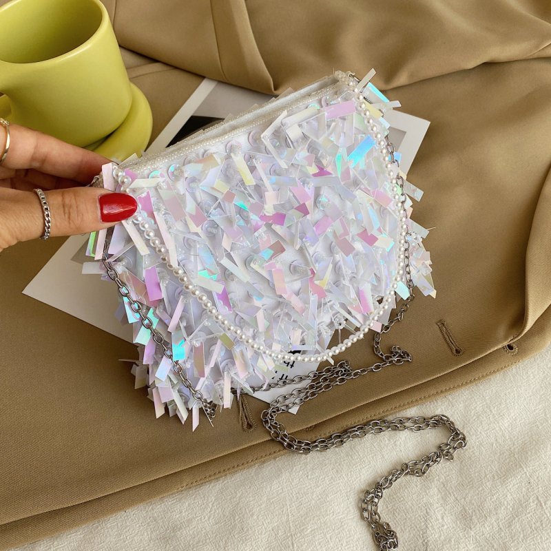 Women's Fashion Retro Sequin Tassel Handbag $63.39 Dana Fashion Color: Black Women's Bags Product information: Color: white, black, gold, silver, pink Material: acrylic plastic Popular elements: sequins Lining texture: polyester Bag shape: horizontal squa