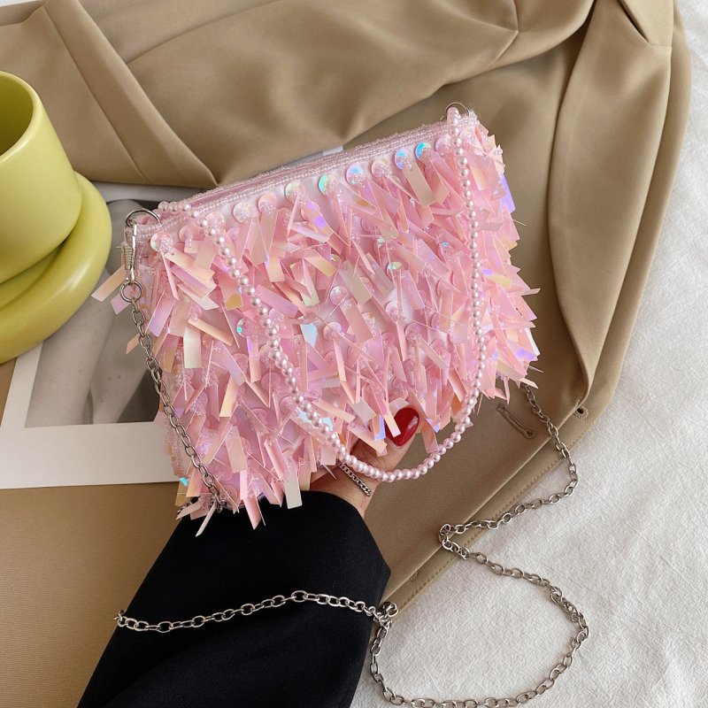 Women's Fashion Retro Sequin Tassel Handbag $63.39 Dana Fashion Color: Black Women's Bags Product information: Color: white, black, gold, silver, pink Material: acrylic plastic Popular elements: sequins Lining texture: polyester Bag shape: horizontal squa