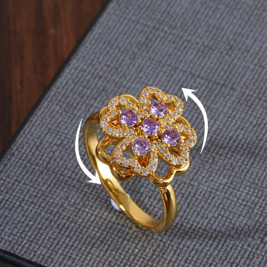 Women's Fashion Rotatable Purple Diamond Ring $15.50 Dana Fashion Color: J1560Purple Women's Accessories Product information: Type: Ring Color: J1560-Purple Applicable population: Female Material: Copper Shape: Flower Style: Natural Packing list: Ring *1