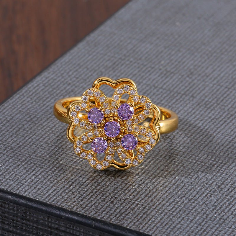 Women's Fashion Rotatable Purple Diamond Ring $15.50 Dana Fashion Color: J1560Purple Women's Accessories Product information: Type: Ring Color: J1560-Purple Applicable population: Female Material: Copper Shape: Flower Style: Natural Packing list: Ring *1