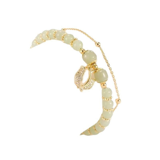 Women's Fashion Simple Tulip Double-layer Bracelet $12.60 Dana Fashion Color: Green Women's Accessories Product information: Treatment Process: Electroplating Color: double-layer Tulip Hetian jade bracelet Applicable population: Female Style: Women's Mate
