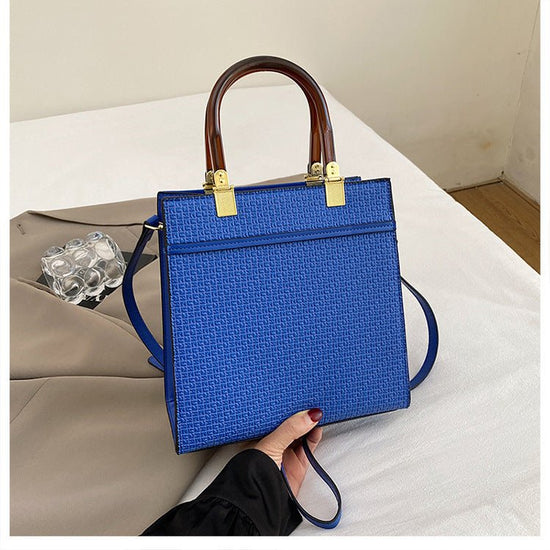 Women's Fashion Stone Pattern Handbag $39.50 Dana Fashion Color: Blue Women's Bags Product information: Color: white, black, orange, blue, brown, brown Hardness: soft Material: PU Suitcase shape: square vertical model Bag internal structure: zipper change