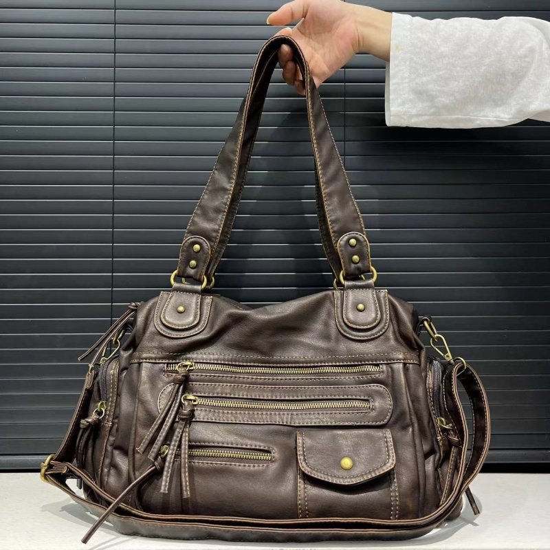 Women's Fashion Y2g Washed Old Motorcycle Bag $89.50 Dana Fashion Color: Brown Women's Bags Product information: Lining texture: Polyester Applicable scenarios: Daily matching Color: Brown Outer bag type: slit pocket Hardness: soft Material: PU Suitcase s