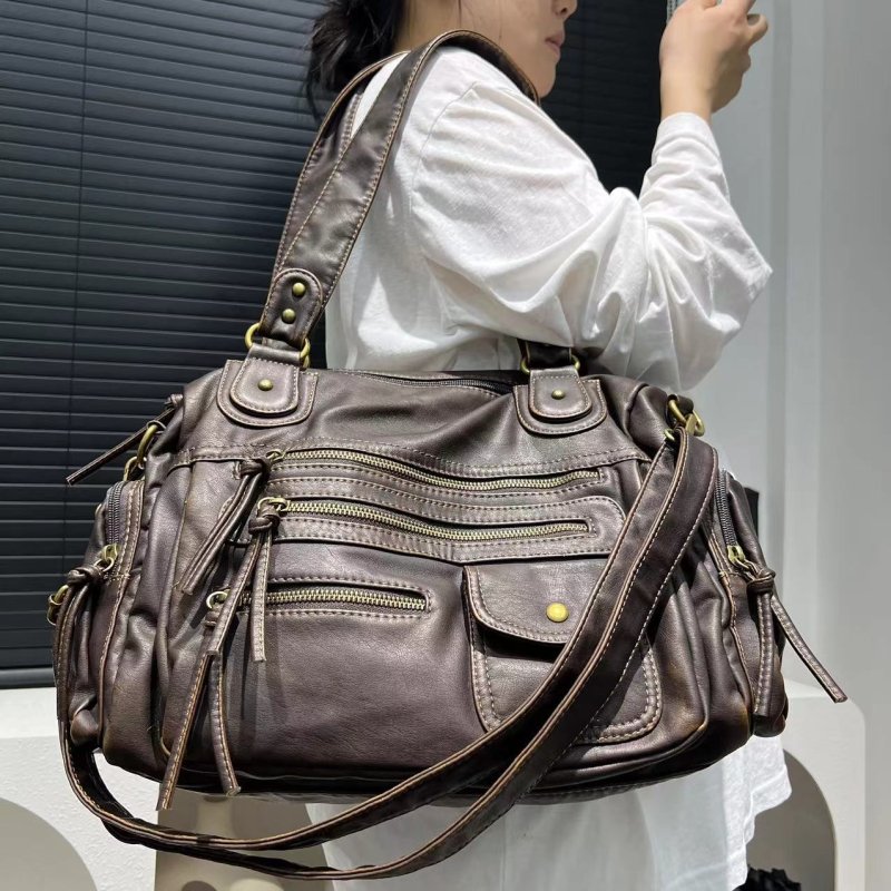 Women's Fashion Y2g Washed Old Motorcycle Bag $89.50 Dana Fashion Color: Brown Women's Bags Product information: Lining texture: Polyester Applicable scenarios: Daily matching Color: Brown Outer bag type: slit pocket Hardness: soft Material: PU Suitcase s