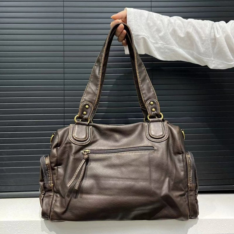 Women's Fashion Y2g Washed Old Motorcycle Bag $89.50 Dana Fashion Color: Brown Women's Bags Product information: Lining texture: Polyester Applicable scenarios: Daily matching Color: Brown Outer bag type: slit pocket Hardness: soft Material: PU Suitcase s