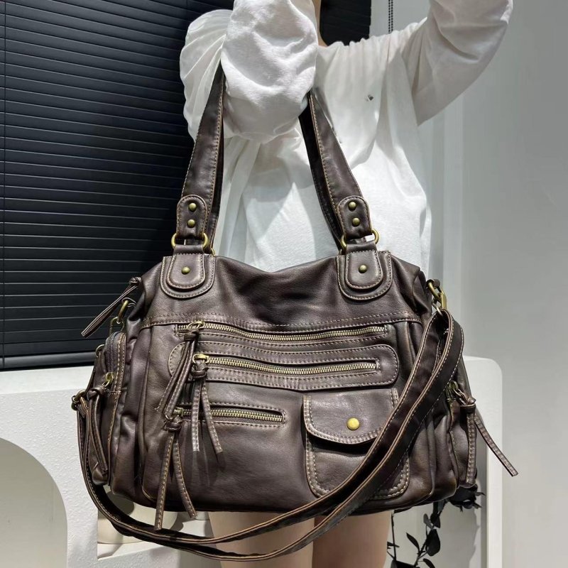 Women's Fashion Y2g Washed Old Motorcycle Bag $89.50 Dana Fashion Color: Brown Women's Bags Product information: Lining texture: Polyester Applicable scenarios: Daily matching Color: Brown Outer bag type: slit pocket Hardness: soft Material: PU Suitcase s
