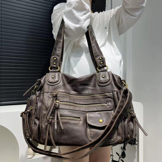 Women's Fashion Y2g Washed Old Motorcycle Bag $89.50 Dana Fashion Color: Brown Women's Bags Product information: Lining texture: Polyester Applicable scenarios: Daily matching Color: Brown Outer bag type: slit pocket Hardness: soft Material: PU Suitcase s