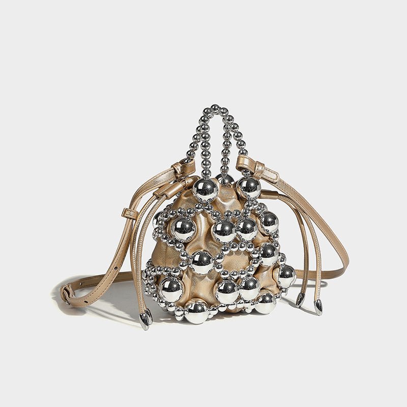 Women's Fashionable All-match Exquisite Hollow Messenger Bag $59.00 Dana Fashion Color: Gold Women's Bags Product information: Lining texture: polyester cotton Applicable scenario: Daily matching Color: silver, black, white, pink, gold Material: acrylic S