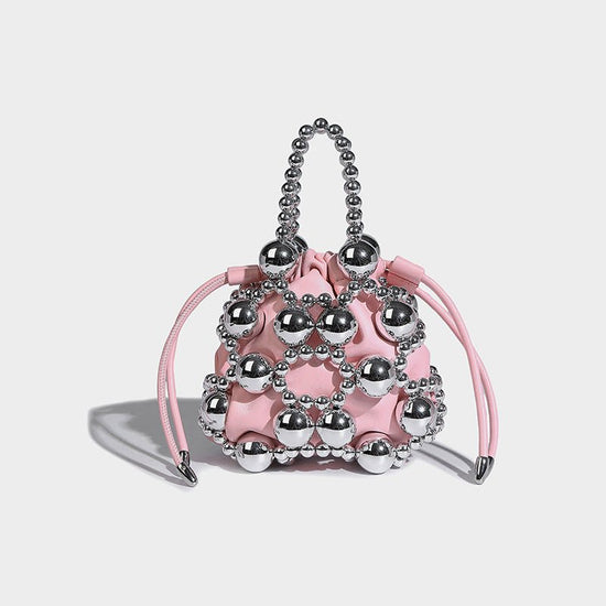 Women's Fashionable All-match Exquisite Hollow Messenger Bag $59.00 Dana Fashion Color: Pink Women's Bags Product information: Lining texture: polyester cotton Applicable scenario: Daily matching Color: silver, black, white, pink, gold Material: acrylic S