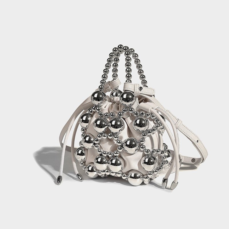 Women's Fashionable All-match Exquisite Hollow Messenger Bag $59.00 Dana Fashion Color: White Women's Bags Product information: Lining texture: polyester cotton Applicable scenario: Daily matching Color: silver, black, white, pink, gold Material: acrylic