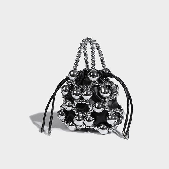 Women's Fashionable All-match Exquisite Hollow Messenger Bag $59.00 Dana Fashion Color: Black Women's Bags Product information: Lining texture: polyester cotton Applicable scenario: Daily matching Color: silver, black, white, pink, gold Material: acrylic