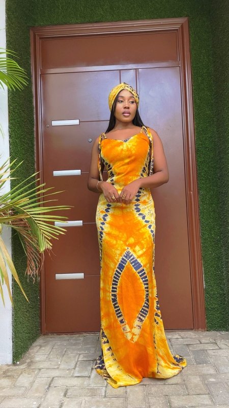 Women's Fashionable Printed Suspenders Slim Fit Long Dress Long Dress Scarf $49.90 Dana Fashion Color: Orange Size: L Women's clothing Product information: Pattern: Rainbow Skirt type: hip skirt Color: dark pink, orange, peacock blue Waist Type: Mid waist