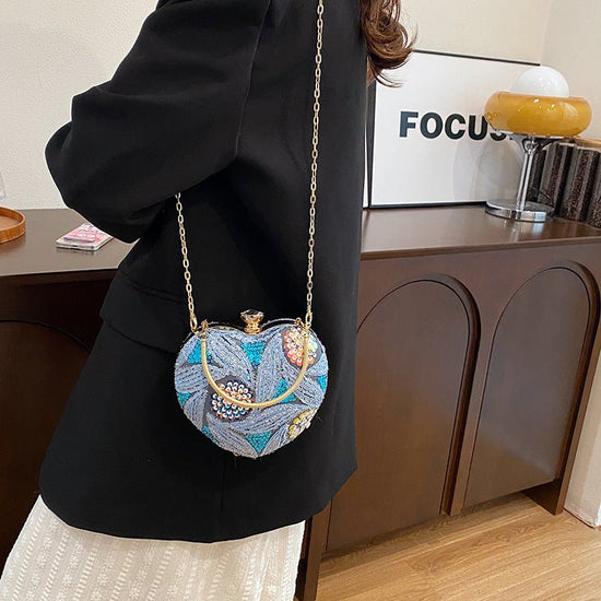Women's Fashionable Sequins Shoulder Bag Retro $29.49 Dana Fashion Color: Blue Women's Bags Product information: Color: blue, purple, gold, brown, yellow Hardness: hard Material: Special Suitcase shape: heart shape Popular elements: Sequins Number of shou