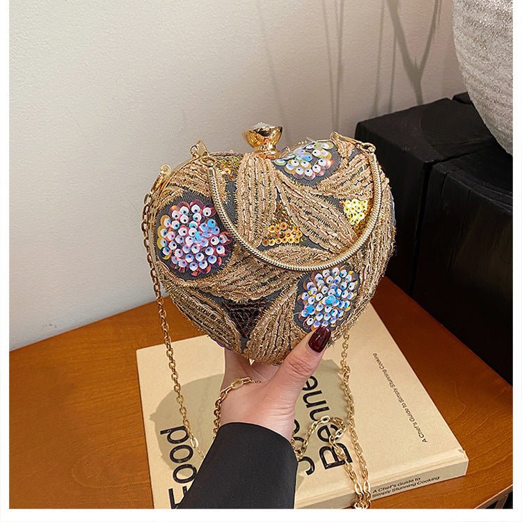 Women's Fashionable Sequins Shoulder Bag Retro $29.49 Dana Fashion Color: Yellow Women's Bags Product information: Color: blue, purple, gold, brown, yellow Hardness: hard Material: Special Suitcase shape: heart shape Popular elements: Sequins Number of sh