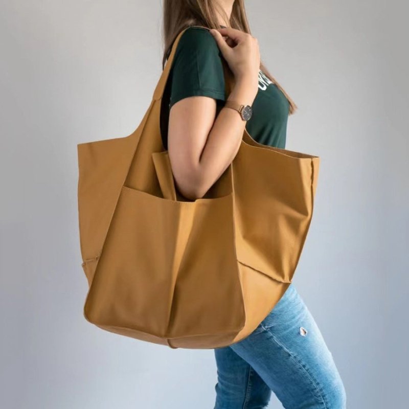 Women's Fashionable Simple Soft Leather Large Capacity Handbag $56.81 Dana Fashion Color: Yellow Women's Bags Product information: Lining texture: PU Applicable scenario: Daily matching Color: black, brown, dark brown (coffee red), light brown, khaki, dar