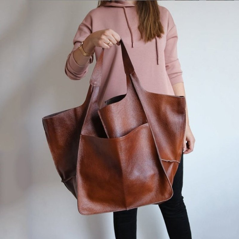 Women's Fashionable Simple Soft Leather Large Capacity Handbag $56.81 Dana Fashion Color: Dark Brown Red Coffee Women's Bags Product information: Lining texture: PU Applicable scenario: Daily matching Color: black, brown, dark brown (coffee red), light br