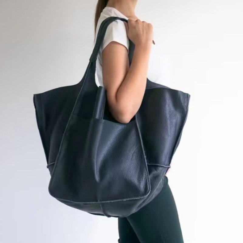 Women's Fashionable Simple Soft Leather Large Capacity Handbag $56.81 Dana Fashion Color: Dark Blue Women's Bags Product information: Lining texture: PU Applicable scenario: Daily matching Color: black, brown, dark brown (coffee red), light brown, khaki,