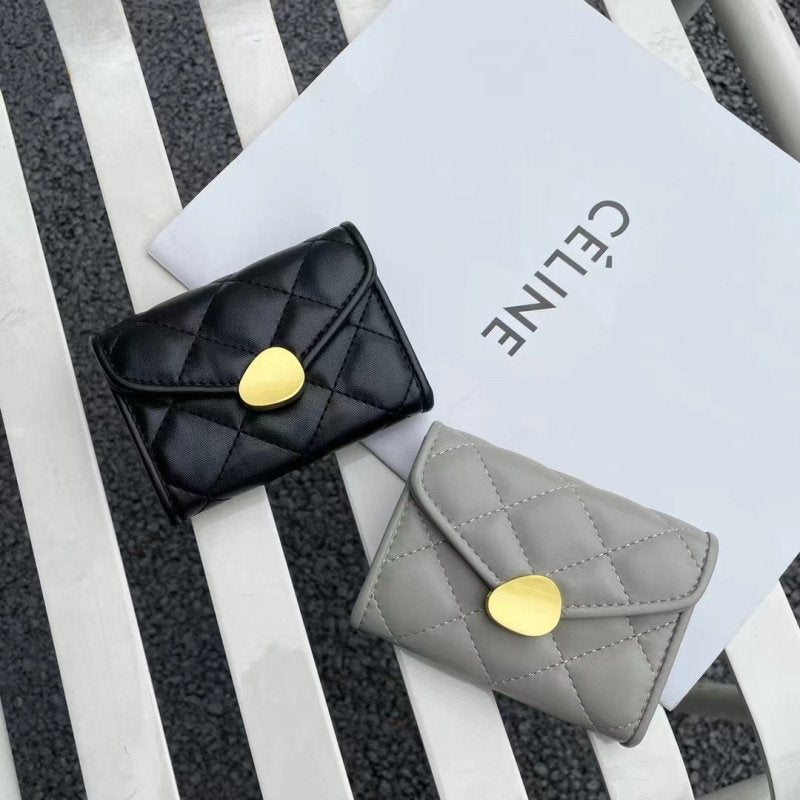 Women's Flip Rhombus Leather Short Wallet $24.86 Dana Fashion Color: Black Women's Bags Product information: Material: genuine leather Cortical features: sheepskin Wallet fold count: 20% off Material texture: Nylon Colors: black, blue, gray, pink, yellow