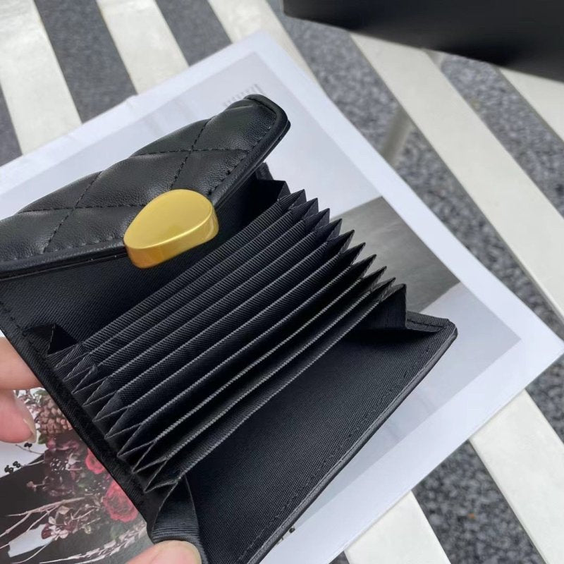 Women's Flip Rhombus Leather Short Wallet $24.86 Dana Fashion Color: Black Women's Bags Product information: Material: genuine leather Cortical features: sheepskin Wallet fold count: 20% off Material texture: Nylon Colors: black, blue, gray, pink, yellow