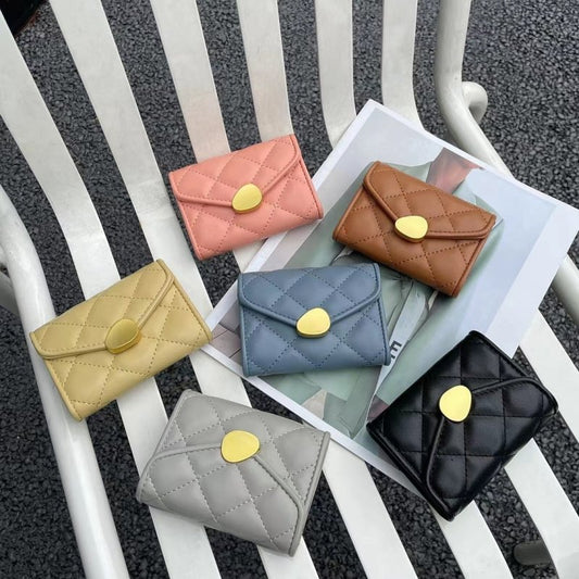 Women's Flip Rhombus Leather Short Wallet $24.86 Dana Fashion Color: Black Women's Bags Product information: Material: genuine leather Cortical features: sheepskin Wallet fold count: 20% off Material texture: Nylon Colors: black, blue, gray, pink, yellow