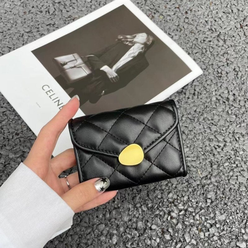 Women's Flip Rhombus Leather Short Wallet $24.86 Dana Fashion Color: Black Women's Bags Product information: Material: genuine leather Cortical features: sheepskin Wallet fold count: 20% off Material texture: Nylon Colors: black, blue, gray, pink, yellow
