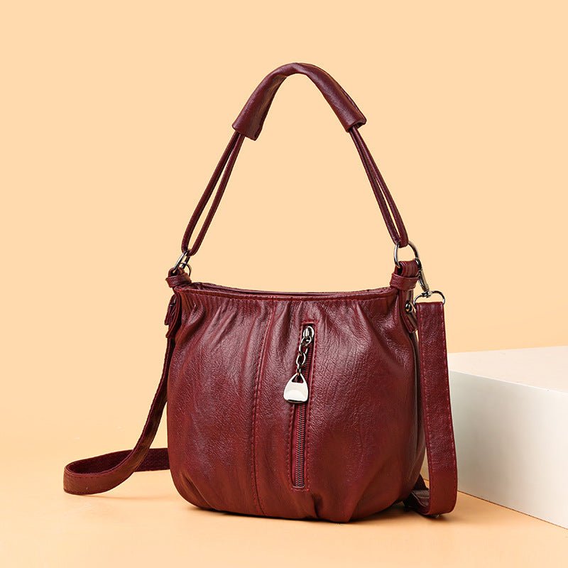 Women's Handbag Vintage Shoulder Large-capacity Crossbody Bag $29.00 Dana Fashion Color: Wine Red Women's Bags Product information: Lining texture: polyester cotton Color: black, light brown, wine red, colorful Hardness: soft Material: PU Suitcase shape: