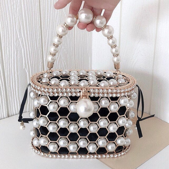 Women's Ins Bucket Bag Versatile Diagonal Pearl Bag $120.00 Dana Fashion Color: Black Women's Bags Product Information: Color: Apricot inner bag style, black inner bag style Style: Fashion Article No.: 3602 Material: PU Cortical characteristics: pu Luggag