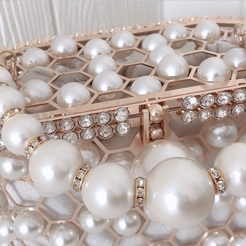 Women's Ins Bucket Bag Versatile Diagonal Pearl Bag $120.00 Dana Fashion Color: Apricot Women's Bags Product Information: Color: Apricot inner bag style, black inner bag style Style: Fashion Article No.: 3602 Material: PU Cortical characteristics: pu Lugg