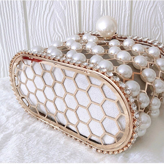 Women's Ins Bucket Bag Versatile Diagonal Pearl Bag $120.00 Dana Fashion Color: Apricot Women's Bags Product Information: Color: Apricot inner bag style, black inner bag style Style: Fashion Article No.: 3602 Material: PU Cortical characteristics: pu Lugg