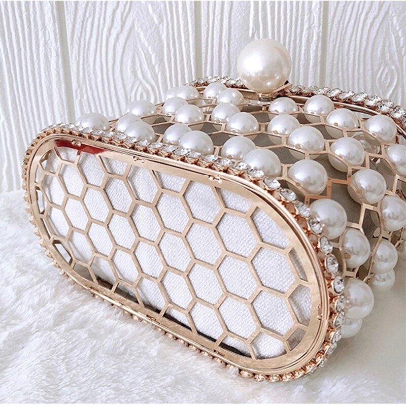 Women's Ins Bucket Bag Versatile Diagonal Pearl Bag $120.00 Dana Fashion Color: Apricot Women's Bags Product Information: Color: Apricot inner bag style, black inner bag style Style: Fashion Article No.: 3602 Material: PU Cortical characteristics: pu Lugg