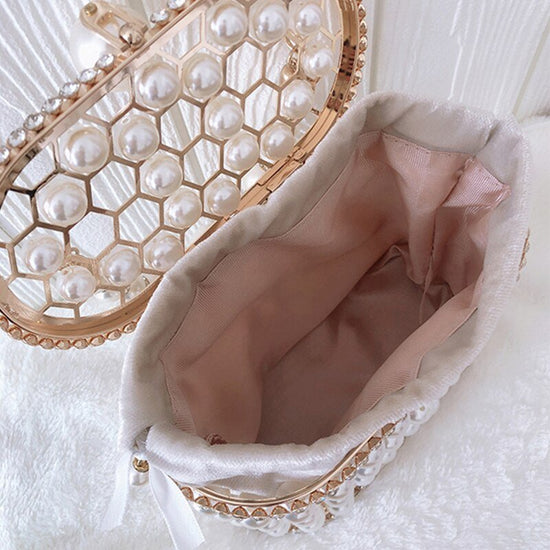 Women's Ins Bucket Bag Versatile Diagonal Pearl Bag $120.00 Dana Fashion Color: Apricot Women's Bags Product Information: Color: Apricot inner bag style, black inner bag style Style: Fashion Article No.: 3602 Material: PU Cortical characteristics: pu Lugg