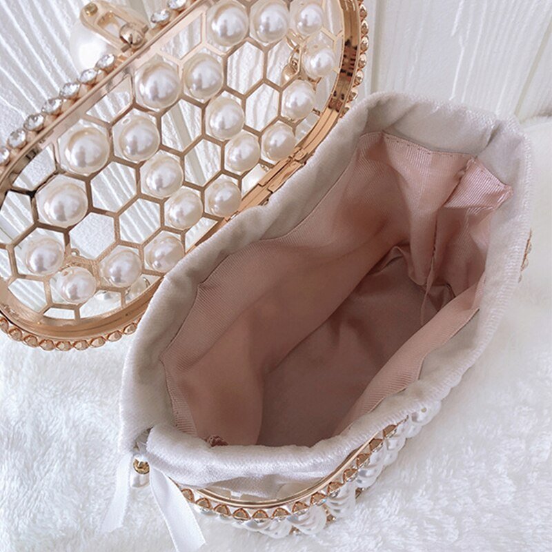 Women's Ins Bucket Bag Versatile Diagonal Pearl Bag $120.00 Dana Fashion Color: Apricot Women's Bags Product Information: Color: Apricot inner bag style, black inner bag style Style: Fashion Article No.: 3602 Material: PU Cortical characteristics: pu Lugg