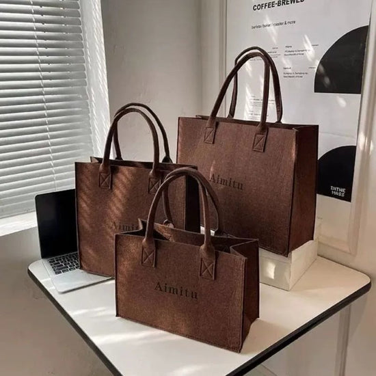 Women's Ins Large Capacity Travel Good-looking All-match Felt Portable Gift Bag $15.00 Dana Fashion Color: All kinds of coffee Specification Size: L Women's Bags Product information: Composition and content: Chemical Fiber Another name: Letter felt handba