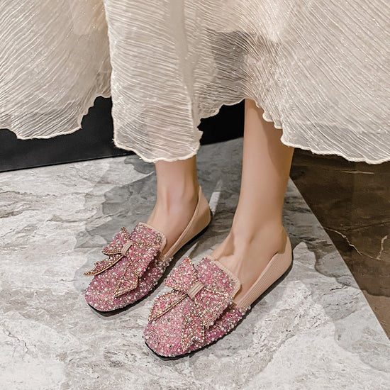 Women's Korean-style Bow Pearl Flat Shoes $69.90 Dana Fashion Color: Black Size: 33 Women's shoes Product information: Pattern: solid color Lining material: Microfiber Color: black, pink, gold Upper height: low top Heel height: flat heel Heel shape: flat