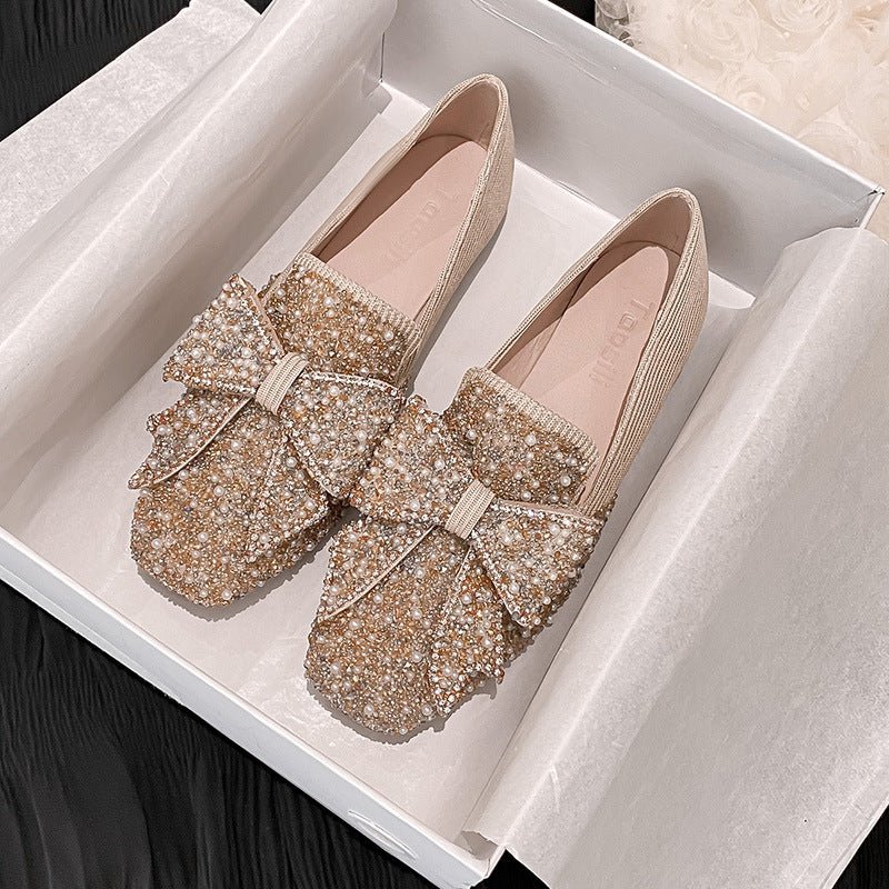 Women's Korean-style Bow Pearl Flat Shoes $69.90 Dana Fashion Color: Black Size: 33 Women's shoes Product information: Pattern: solid color Lining material: Microfiber Color: black, pink, gold Upper height: low top Heel height: flat heel Heel shape: flat