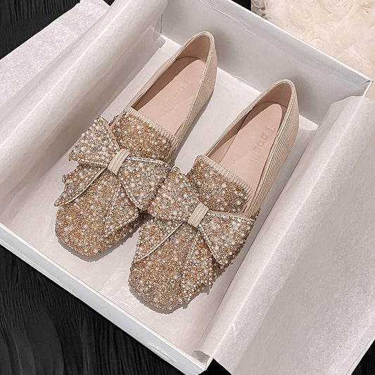 Women's Korean-style Bow Pearl Flat Shoes $69.90 Dana Fashion Color: Black Size: 33 Women's shoes Product information: Pattern: solid color Lining material: Microfiber Color: black, pink, gold Upper height: low top Heel height: flat heel Heel shape: flat